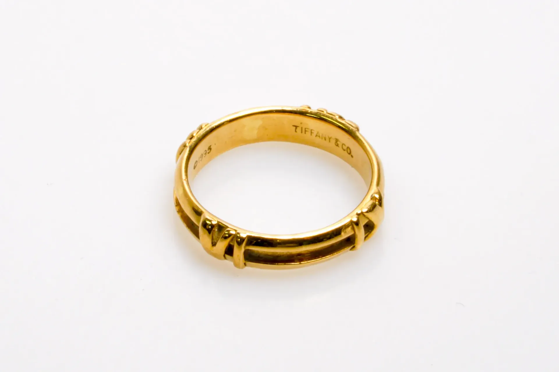 [DV31-33] Bague Tiffany & Co. or 750 : anneau à décor de cordage ligaturé, taille 54